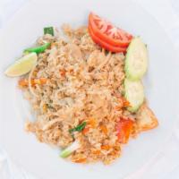 Thai Fried Rice · Stir-fried rice with tomatoes, onions, carrots and egg, in our homemade sauce.