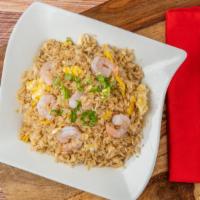 Shrimp Fried Rice · With egg and topped with green onion.