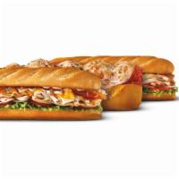 Hot Subs Party Box · Choose from four of our most crowd-pleasing hot subs, cut in individual portions, ready to p...