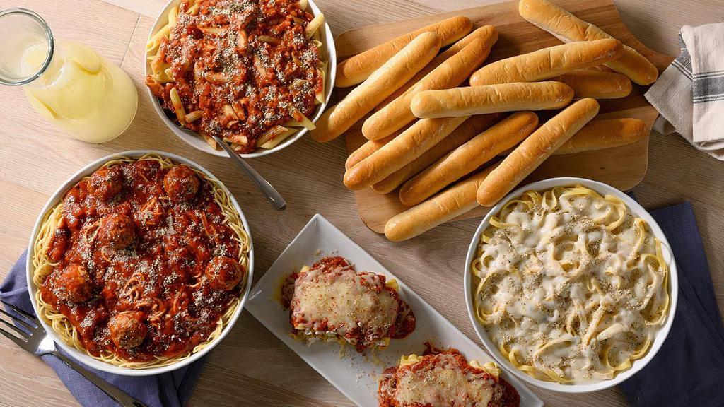 Ultimate Sampler Family Meal · Family Size Fettuccine Alfredo, Family Size Spaghetti with Meatballs, Family Size Baked Lasagna, Penne with Meat Sauce, Half-Gallon Tea or Lemonade.. Served with 16 Signature Garlic Breadsticks.