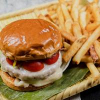 The Impossible Burger · High protein veggie burger, portobello mushroom, bibb, tomato, brioche bun, fries.