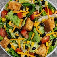 Baja · romaine & iceberg greens, plum tomatoes, corn, black beans, cheddar cheese, Creamy Avocado d...