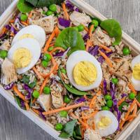 Wok With Jasmine Rice · spinach, red cabbage, green peas, carrots, egg, fire roasted chicken mixed with soy sauce & ...