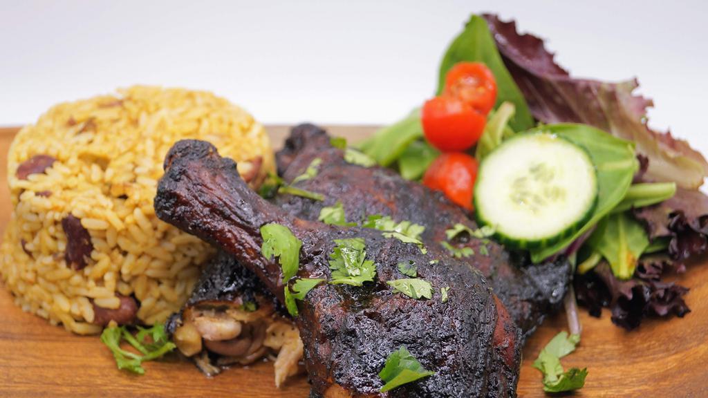 Grilled Jerk Chicken · **SEA Signature Spicy marinated grilled chicken, served with your choice of any two sides.