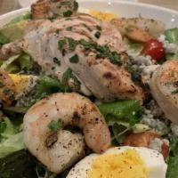 Cobb Salad · grilled chicken, hardboiled egg, bacon, avocado, baby heirloom tomato, bleu cheese crumble, ...