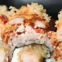 Double Decker · Shrimp tempura, cream cheese, mixed Kani, ebi, spicy mayo, eel sauce, tempura flakes. Some i...