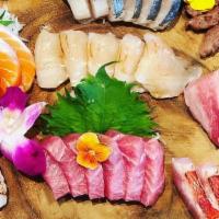 Sashimi Platter · Chef choice of 16 pcs of sashimi. Some items may contain raw ingredients