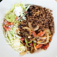 Santa Fe Bowl · A healthy choice! Grilled steak, chicken, or shrimp, cooked with onions, bell peppers, and t...