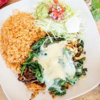 Tapatio Special Mix · choice of grilled chicken and steak. cooked with mushrooms,onion and spinach. Covered with m...