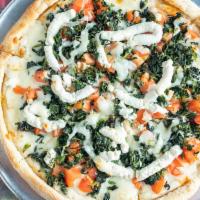 White Pizza · Ricotta cheese, pecorino cheese, garlic, spinach, fresh tomatoes, oregano, basil and mozzare...