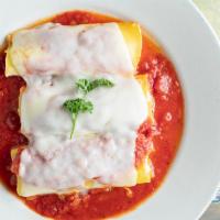 Manicotti Lunch · Hand rolled pasta tubes filled with ricotta cheese, covered with marinara and baked with mel...