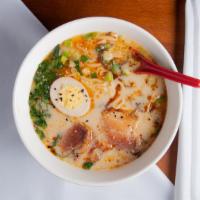 Tonkatsu Ramen · Served with pork belly, but you may substitute with
chicken or tofu. 
Spicy pork bone broth ...