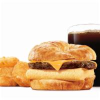 Sausage, Egg & Cheese Croissan'Wich® Meal · Our grab-and-go Sausage, Egg & Cheese Croissan'wich is now made with 100% butter for a soft,...