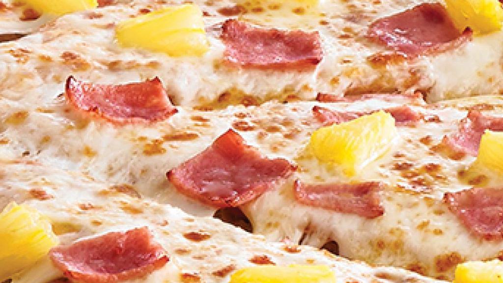 Hawaiian · Traditional crust brushed with garlic butter and topped with tomato sauce, 100% real cheese, ham and pineapple. . Medium and Large: 10 slices. Giant, Deep Dish, Flatbread, and Stuffed Crust: 12 slices.  *Calories listed are by slice