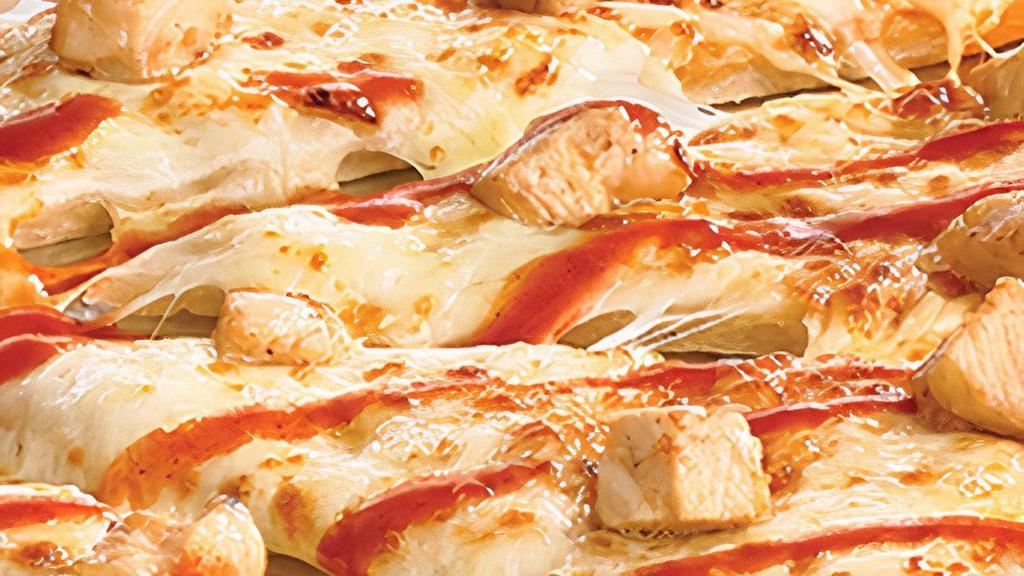 Buffalo Chicken · Traditional crust brushed with garlic butter and topped with spicy Buffalo sauce, 100% real cheese and chicken, then drizzled with more Buffalo sauce. . Medium and Large: 10 slices. Giant, Deep Dish, Flatbread, and Stuffed Crust: 12 slices.  *Calories listed are by slice