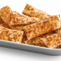 Garlic Cheesy Bread · Crispy, yet tender breadsticks made with our Pan dough. Brushed with garlic butter and sprin...