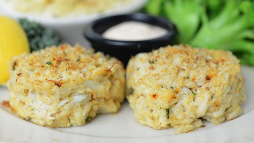 Blue Lump Crab Cakes · Two 4 ounce handmade crab cakes, aioli, choice of two sides