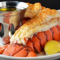 Two Cold Water Lobster Tail Dinner · Two 10-12 ounce cold water lobster tails, drawn butter, choice of side item