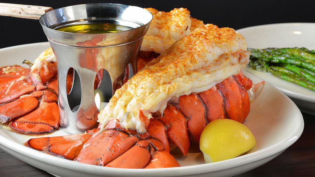 Two Cold Water Lobster Tail Dinner · Two 10-12 ounce cold water lobster tails, drawn butter, choice of side item