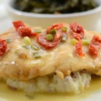 Chicken Piccata · Sauteed chicken, lemon wine sauce, served over mashed potatoes, choice of side item