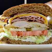 Grilled Chicken Club · Mesquite grilled chicken, wheat bun, ham, bacon, cheddar and jack, lettuce, tomato, pickle, ...