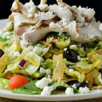 Grilled Chicken Salad · Chilled and sliced chicken, kalamata olive, wontons, onion, feta