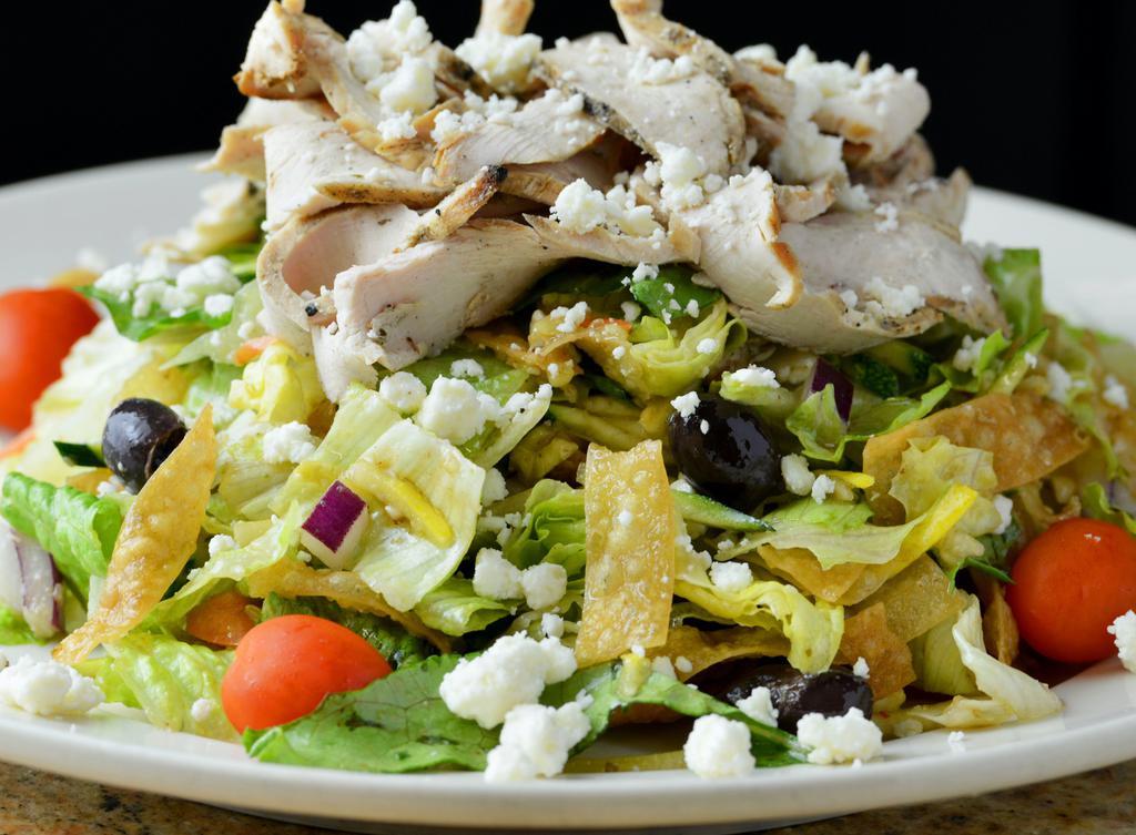 Grilled Chicken Salad · Chilled and sliced chicken, kalamata olive, wontons, onion, feta