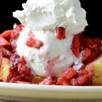 Strawberry Shortcake · Warm pound cake, ice cream, fresh strawberry topping, whipped cream