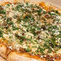 Birria Pizza · Birria-style beef, Chihuahua Cheese, Queso Fresco, Cilantro, Onion and Esquites Crema