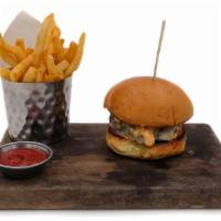 New Realm Burger · House-Ground Brisket, Chuck & Short Rib. White Cheddar, Pickles, Special Sauce, Brioche Bun