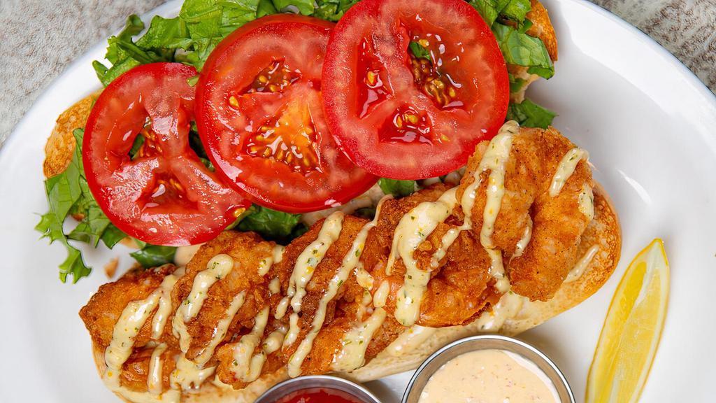 Po' Boys · Crispy fried choice of protein, lettuce, tomato, home made smokey tartar, hoagie bun with catfish or shrimp.