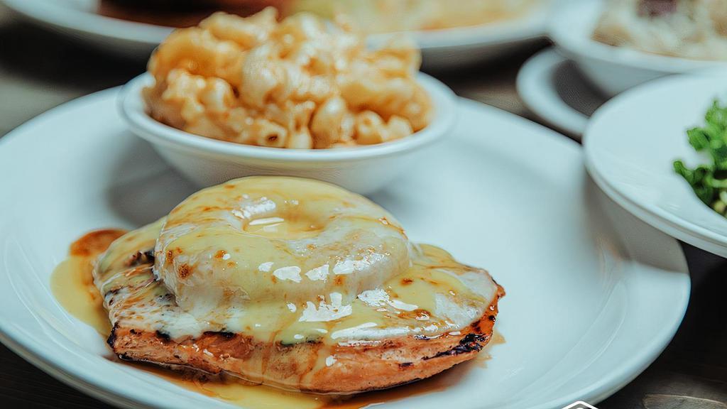 Char-Grilled Chicken · Sweet & tangy marinated chicken breast, char-grilled to absolute perfection, topped with grilled pineapple, provolone, sweet ginger glaze & honey mustard.