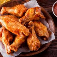 Chicken Wings With Lemon Buffalo Sauce · 10 pieces of Crispy Boneless Chicken wings fried to perfection and served with a zesty Lemon...