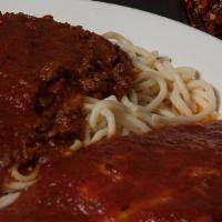 Chicken Parmesan · With spaghetti and marinara sauce.