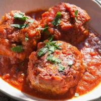 Italian Meatballs · Beef Meatballs, cooked to perfection with a delicious home made tomato sauce. 3 juicy meatba...