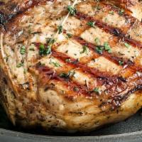 Pork Chop · Delicious Pork Chop on the grill, with 2 sides of your choice, always fresh and juicy!