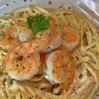 Pasta Alfredo With Shrimps · Pasta with Shrimps and Alfredo Sauce, If you love italian cuisine and Seafood, this is a per...