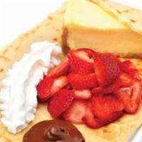 New York Crepe · Cheesecake with strawberries, dulce, and Nutella spread.