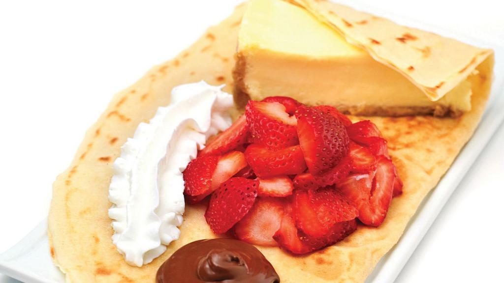 New York · Slice of cheesecake, strawberries Caramel & Nutella.