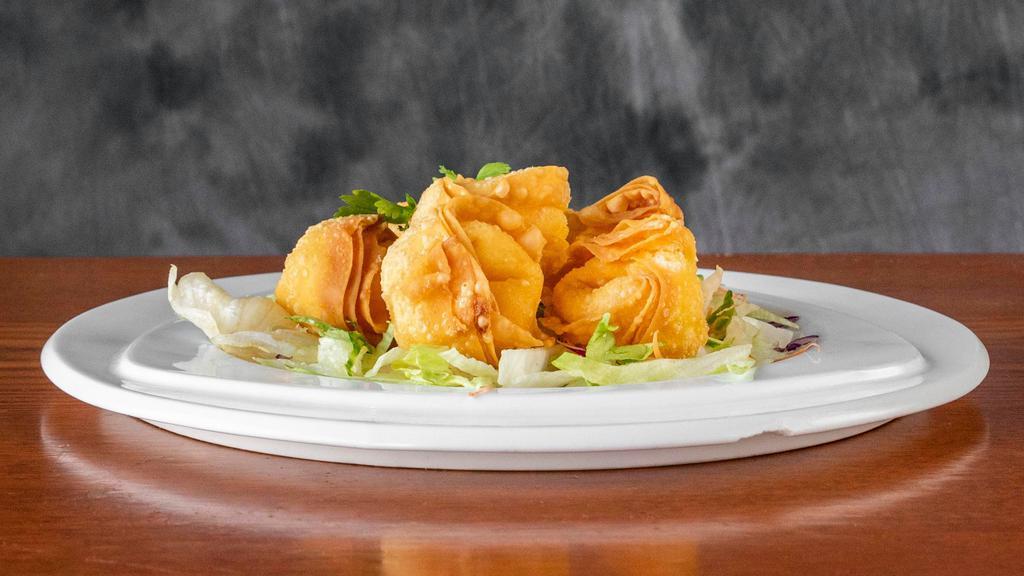 Cheese Wontons · 8 pieces. Sweet cream cheese in a fried wonton shell.