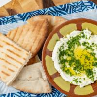 Labneh · Is it yogurt? Is it cheese? We're not sure, but it's delicious! Drizzled with extra-virgin o...