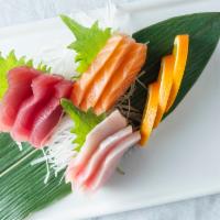 Sashimi Appetizer · Eight pieces of assorted sashimi chef's choice. Raw.