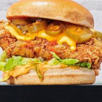 Sweet Sriracha Chicken Sandwich  · Sweet sriracha sauce with a crispy breaded chicken breast, mayo, pickles, lettuce and cheese.