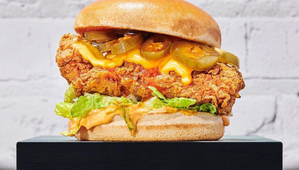 Sweet Sriracha Chicken Sandwich  · Sweet sriracha sauce with a crispy breaded chicken breast, mayo, pickles, lettuce and cheese.