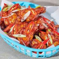 Bbq Wings · Tossed in a rich, classic BBQ sauce