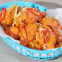Flying Buffalo Wings · Tossed in our flying buffalo sauce