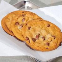 Baked Cookies · Warm chocolate chip cookies, enough to satisfy any sweet tooth.