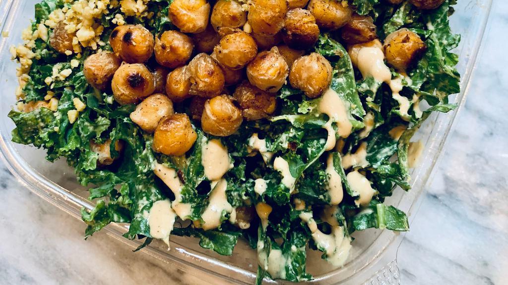Kale Caesar Salad - 12Oz · Fresh kale massaged with our house-made vegan caesar dressing. Topped with crispy chickpeas, cashew 