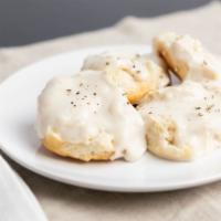 Biscuits And Gravy (500 Cal) · Two buttermilk biscuits served open-faced and smothered in our traditional white gravy.