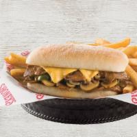 Philly Steak And Cheese Sandwich · Savory shaved ribeye grilled with bell peppers, sweet onions, and mushrooms, then smothered ...